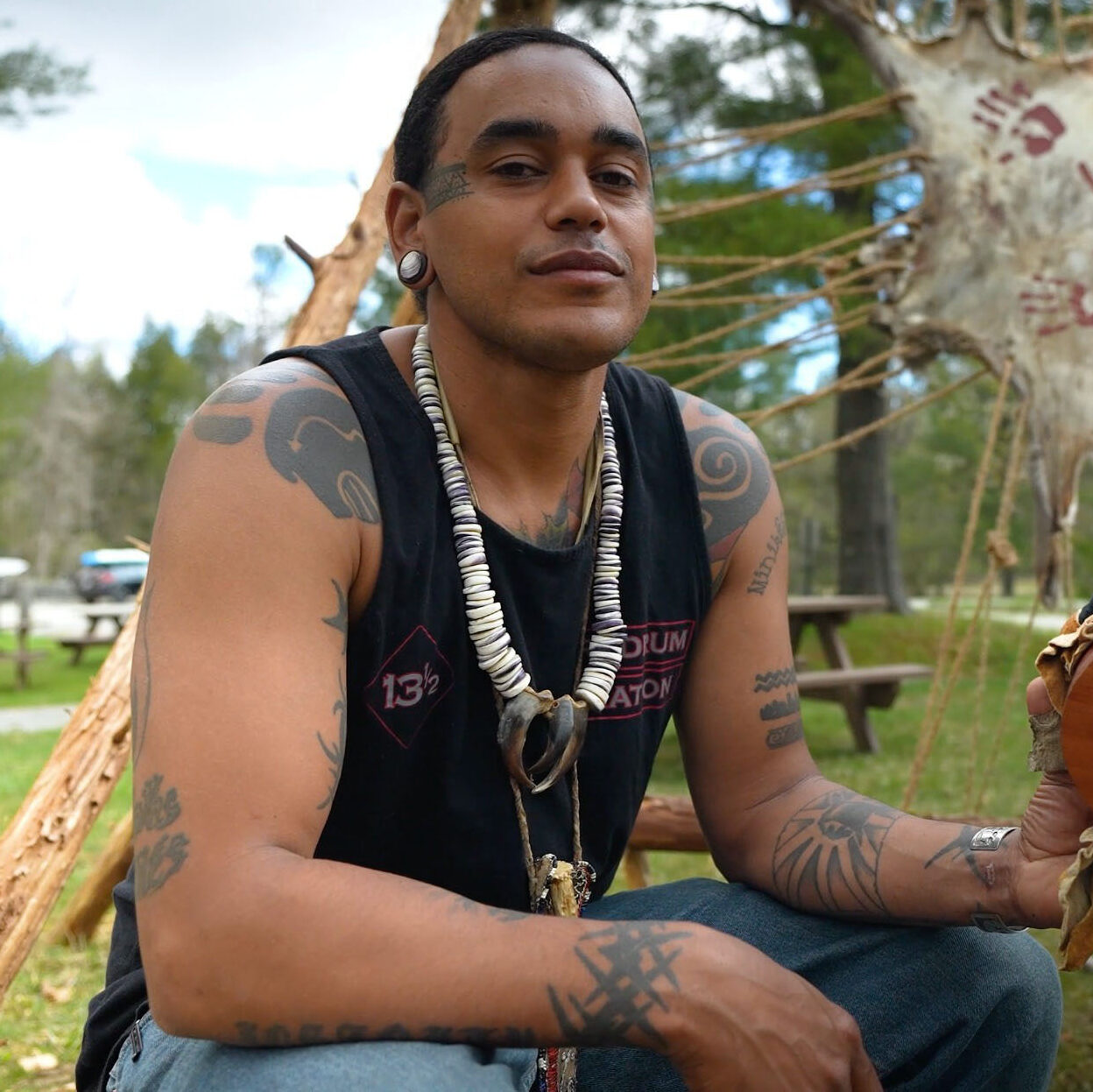 Andre Strongbearheart Gaines Jr. at his homesite installation at Jacob's Pillow, May 2022