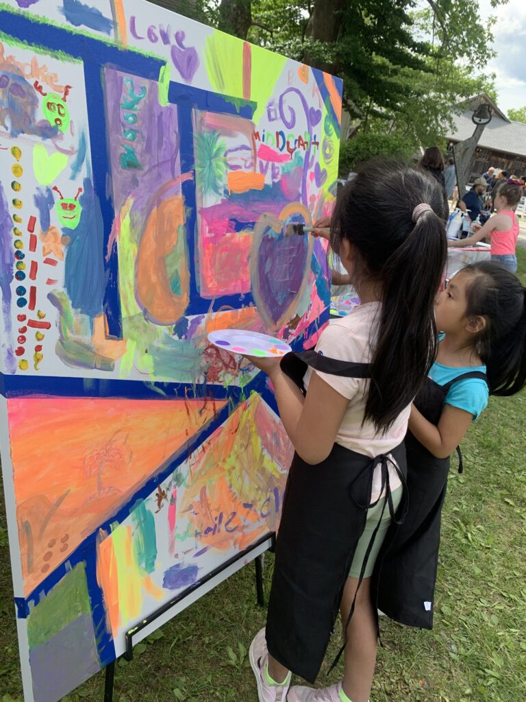 Children painting a mural